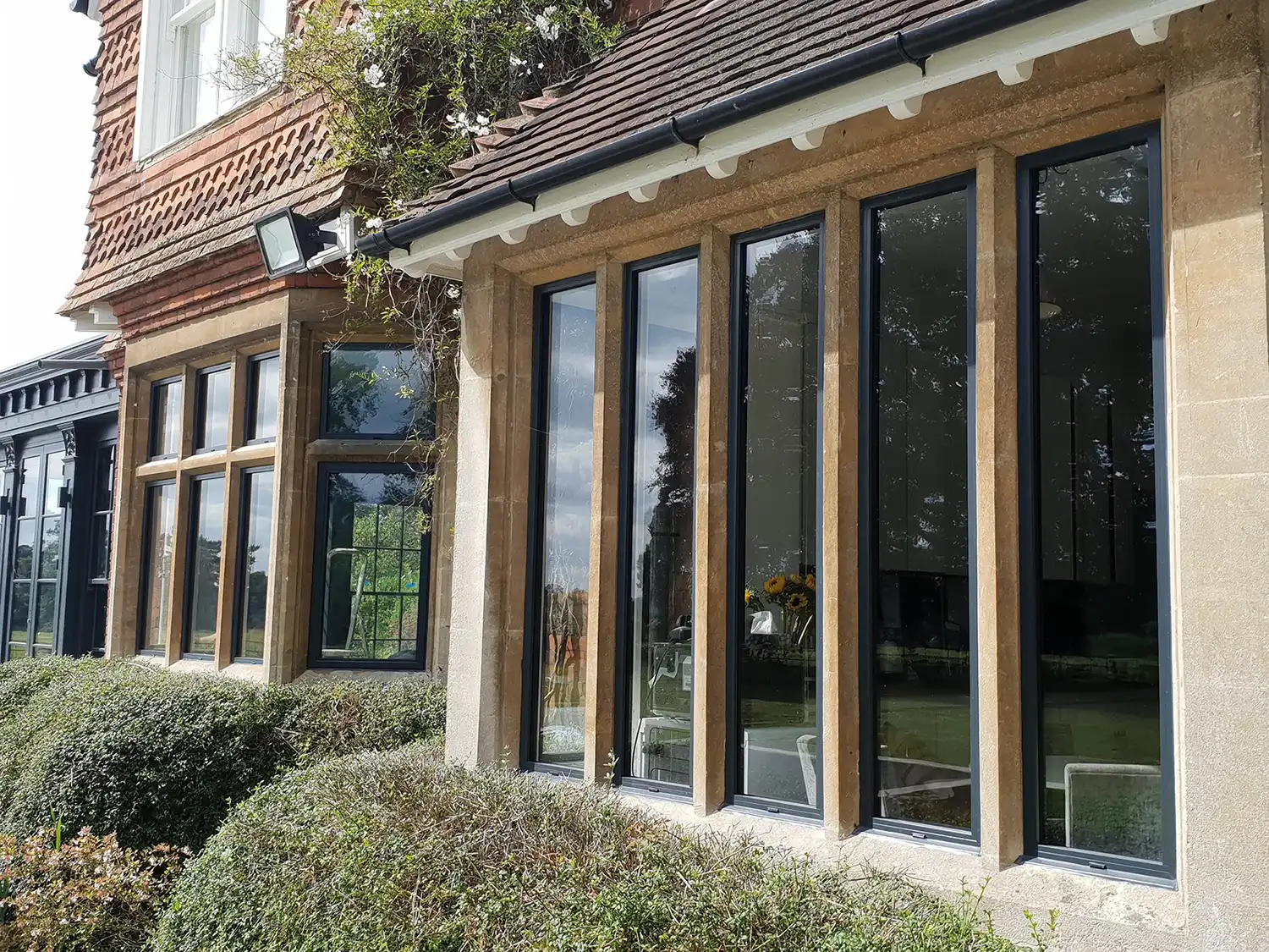 A row of windows on the side of a building.
