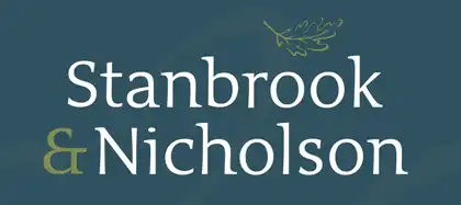 The logo for stanbrook and nicholason.